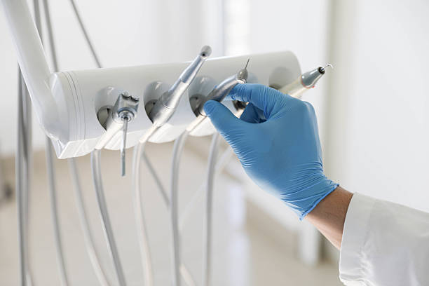 Professional Tooth Extraction technician working in South Hooksett, NH